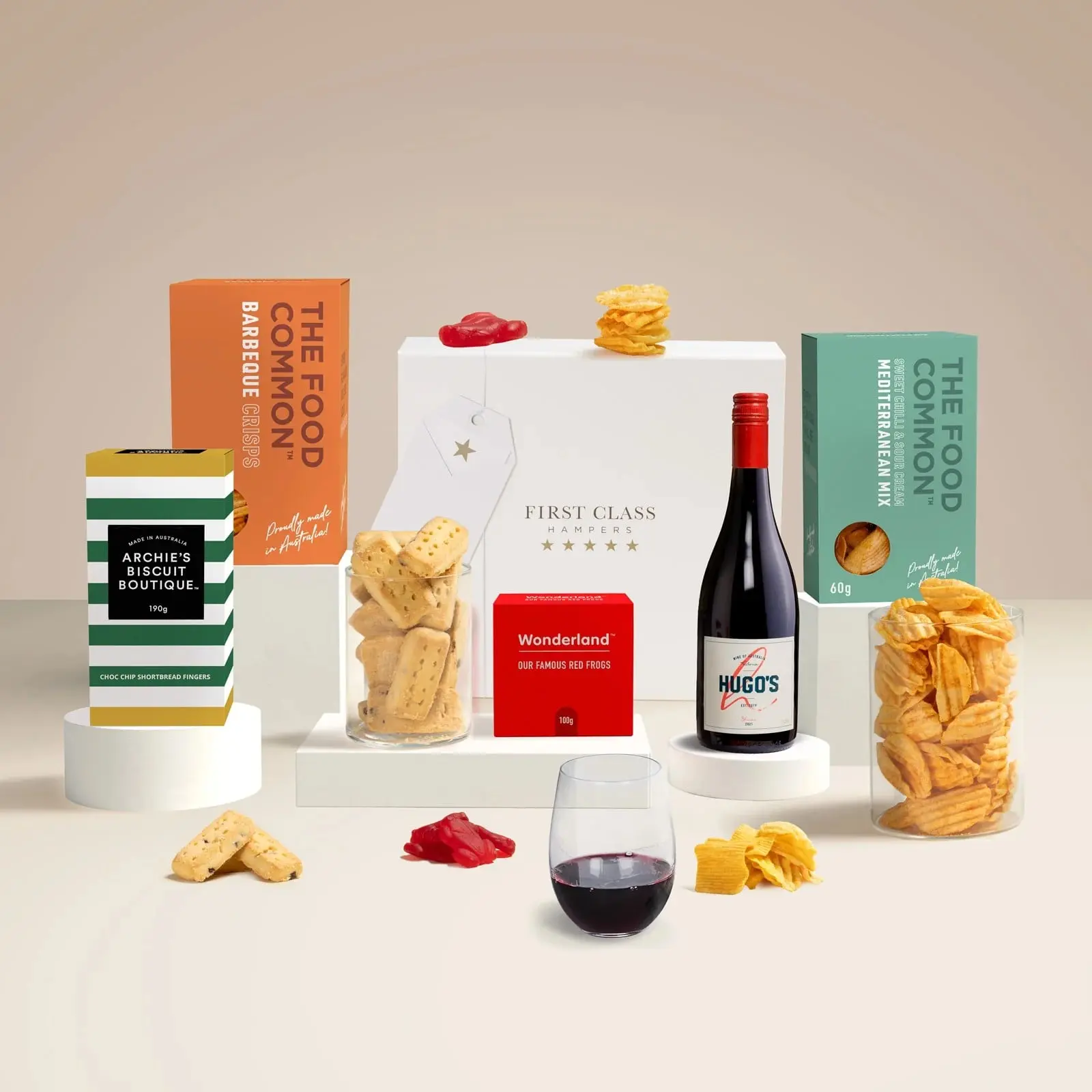 A First Class Hampers gift box with wine and snacks